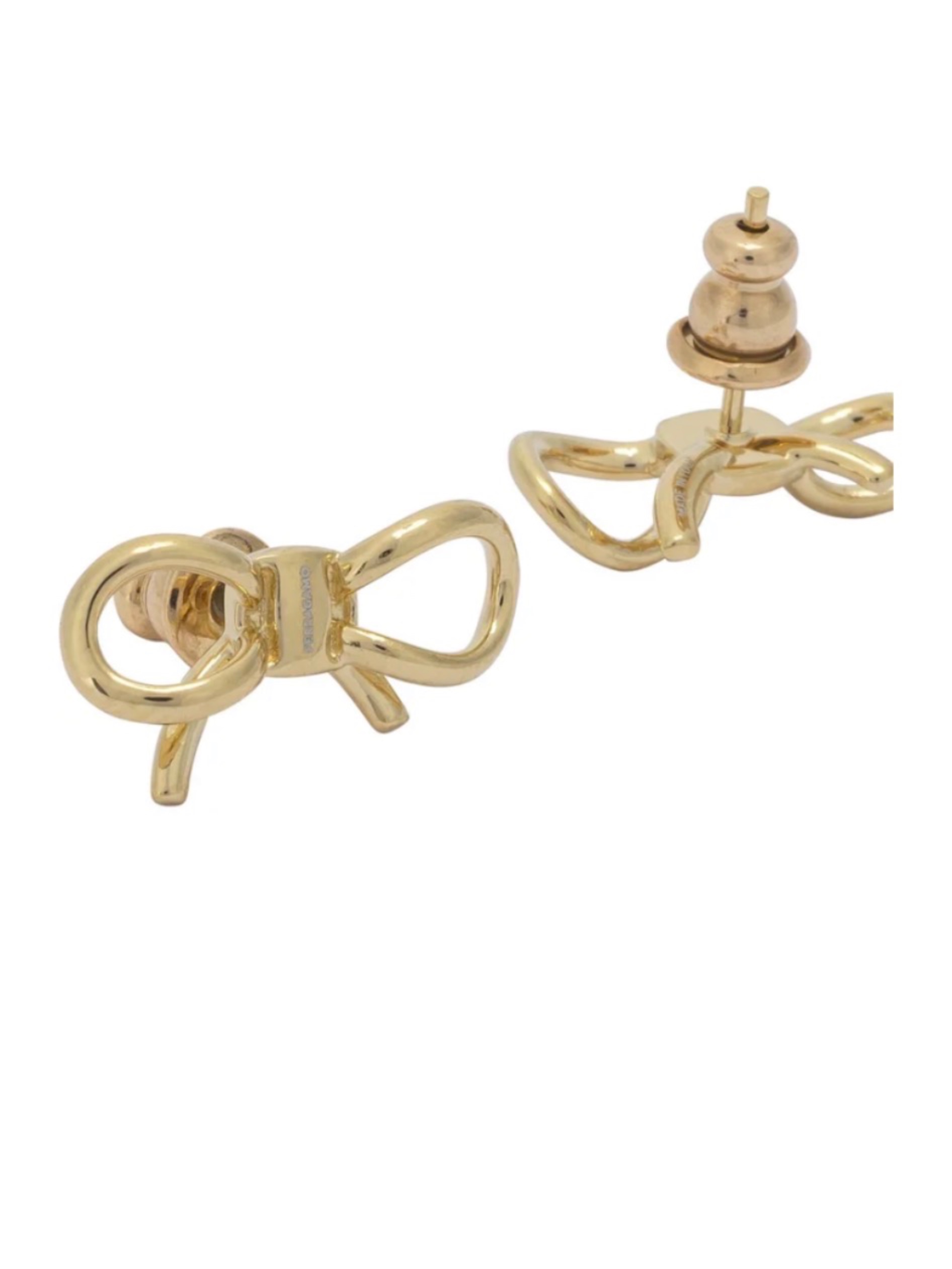 ARETES FERRAGAMO DE MOÑITO DORADOS